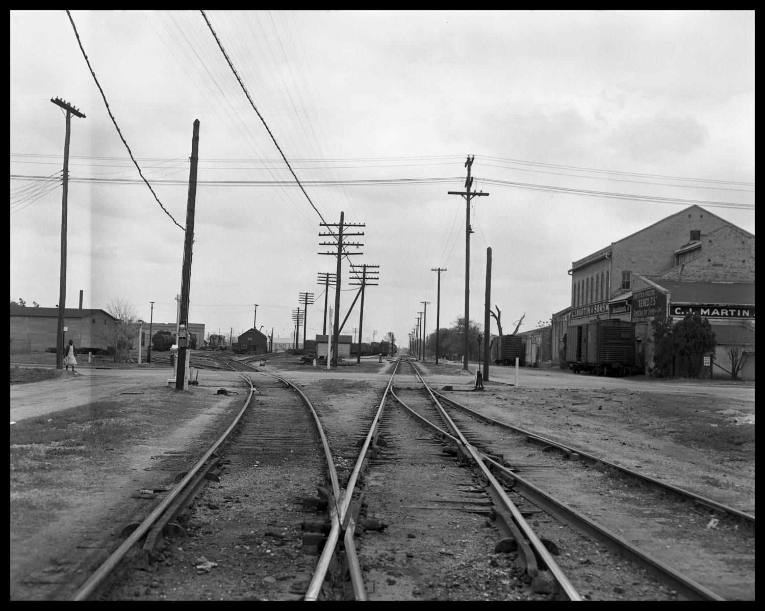 Black lady and railroads Tracks